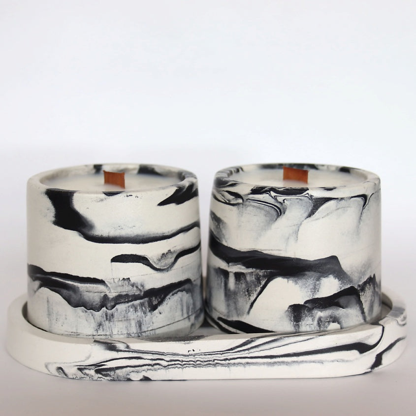 A set of aromatic candles on a stand with the scent of Champagne.